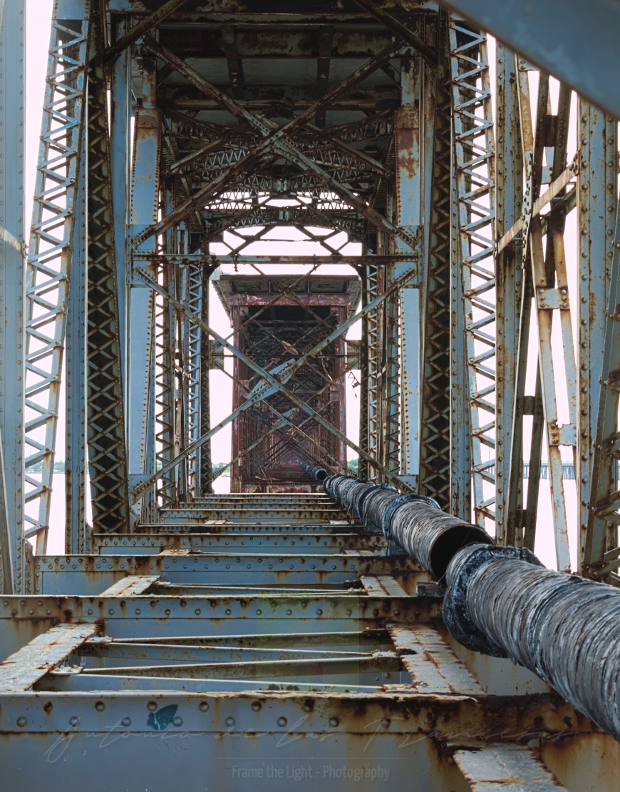Ducts under an iron bridge